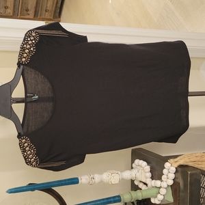 Shoulder beaded top.  Short sleeve Med black top.  She said...